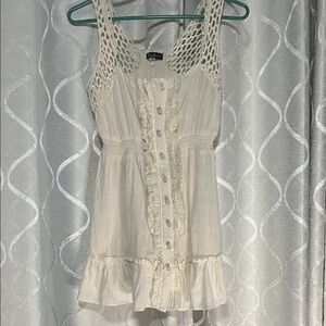 Chic Ivory Sleeveless Blouse with Ruffle Detail